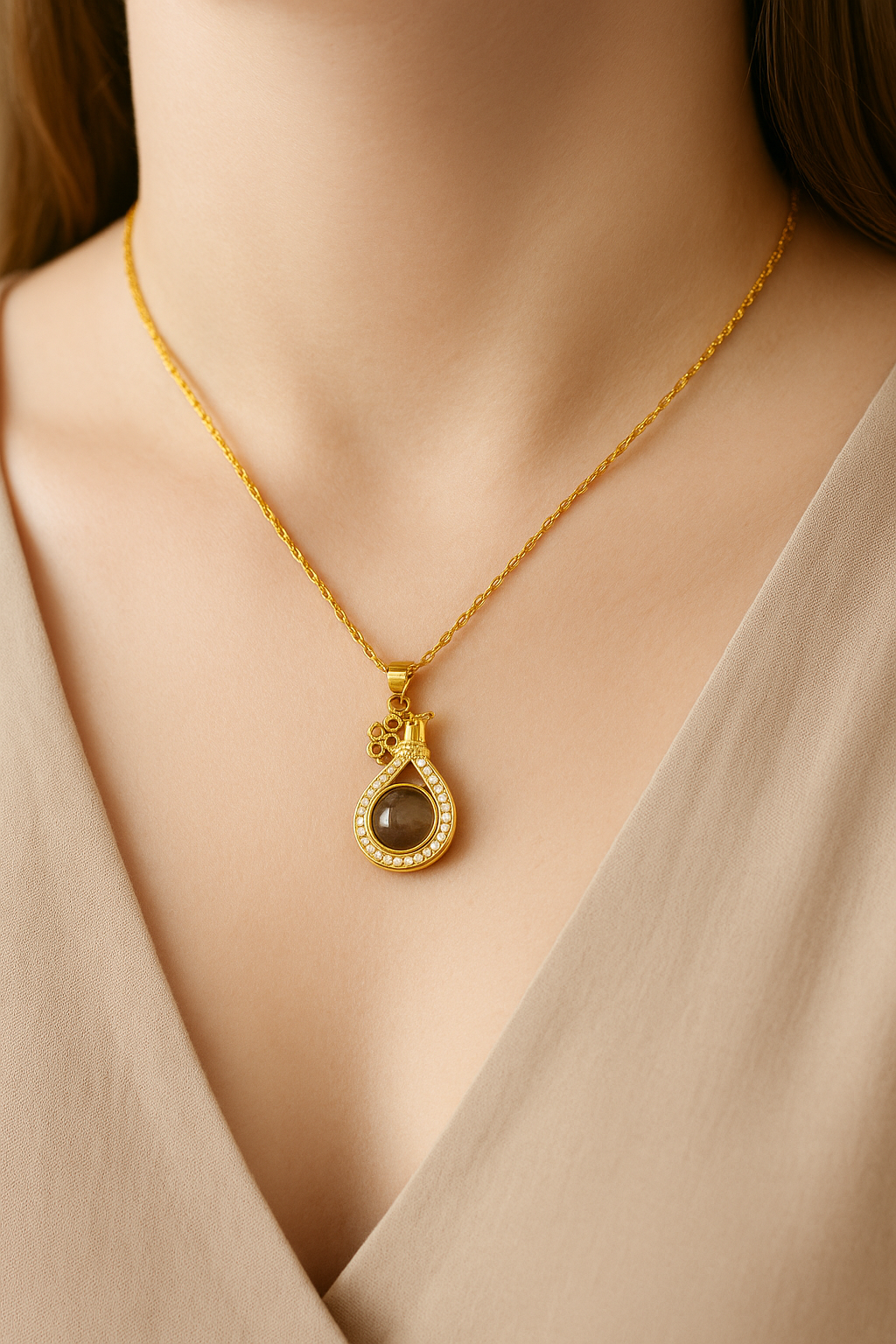 Golden Grace Teardrop Locket