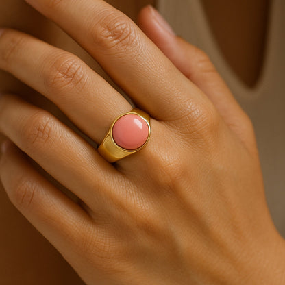 Elegant Gold-Tone Artificial Ring with Pink Stone